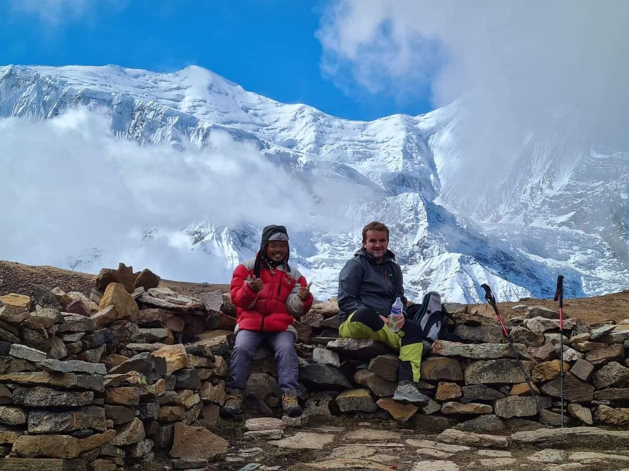 Trekkers resting on the Annapurna Circuit trail